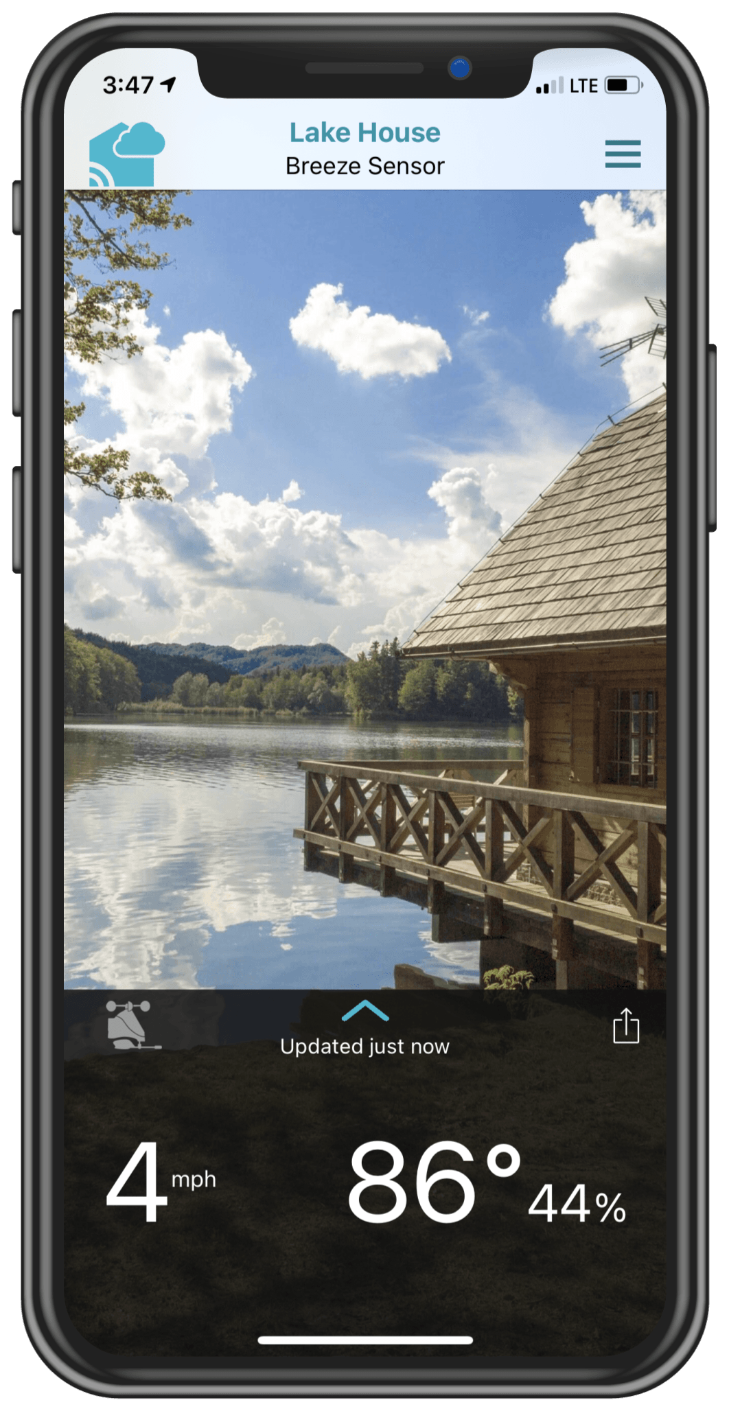 一部显示拉克罗斯湖别墅主应用页面的手机.