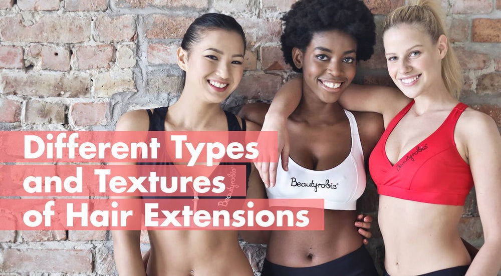 Three women showcasing different hair extensions against a brick wall background.