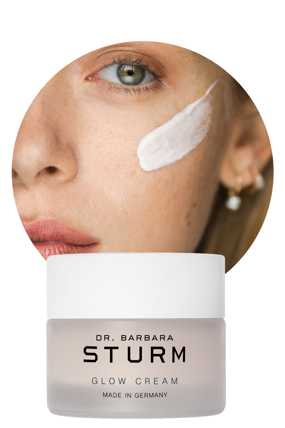 Woman applying Dr. Barbara Sturm Glow Cream on her face.