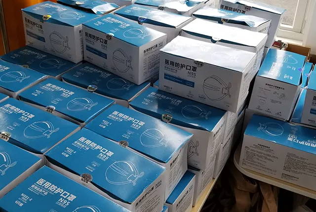 dozens of boxes of N95 masks