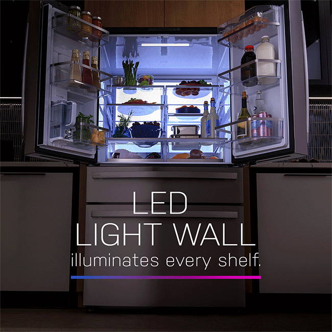 4-door refrigerator with doors open demonstrating the LED light wall - illuminating every shelf