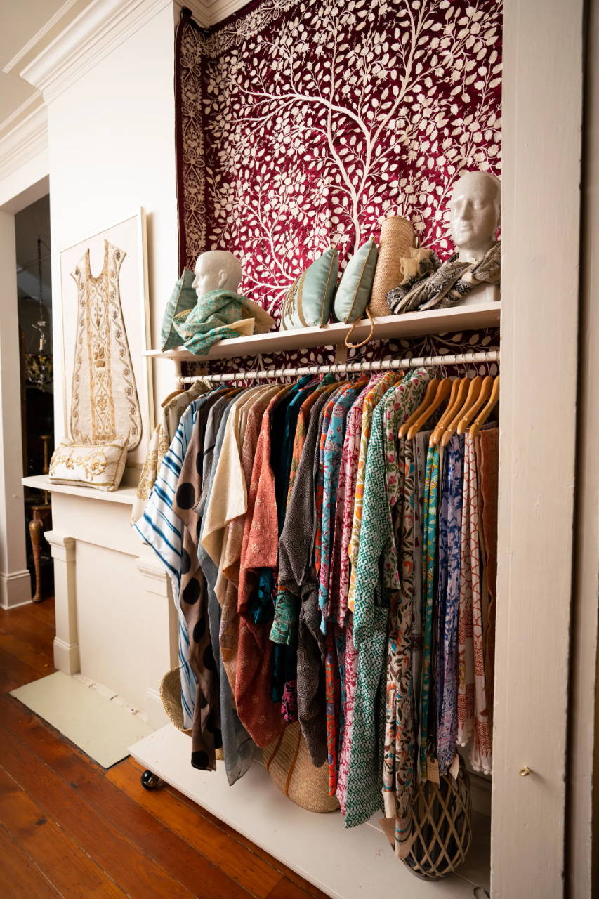 Caftan, robes, jewelry, vintage and antique textiles and B. Viz Design pillows and much more are displayed inside B. Viz Design NOLA Atelier on beautiful Magazine Street in New Orleans, LA. 