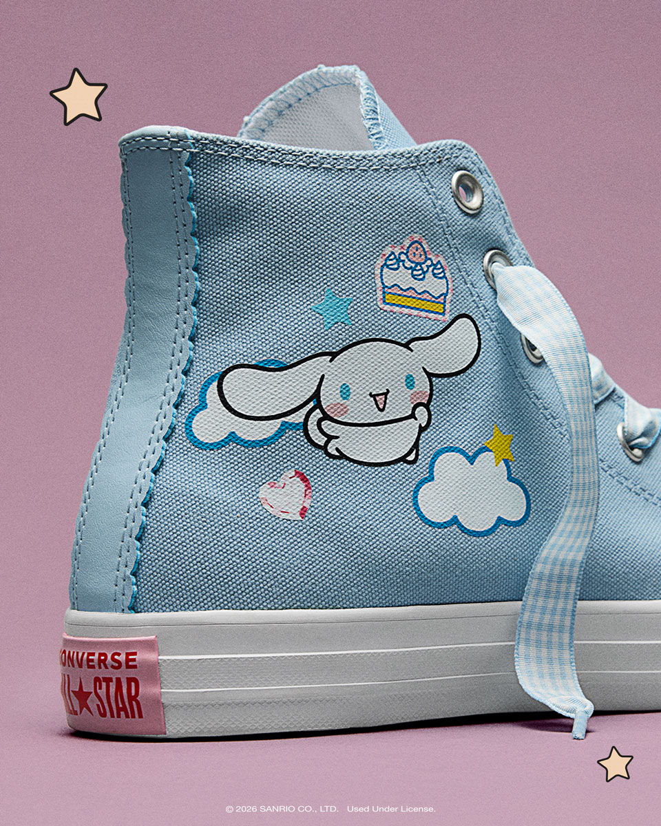 Blue high-top shoe with cartoon character and cloud designs.