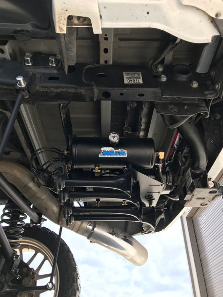 VIAIR air tank dual compressor onboard air system frame mount John's 2014 Dodge Ram 2500 Shocker XL Train HornBlasters featured customer install gallery photo 3