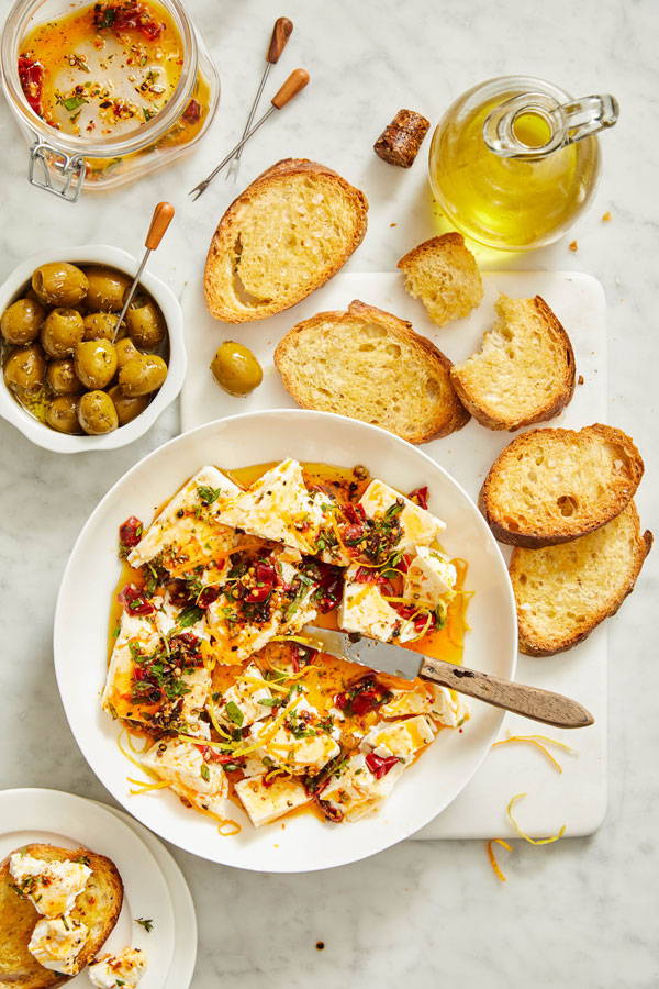 Marinated feta with herbs, citrus and Calabrian chili peppers. Served with crusty bread and olives.