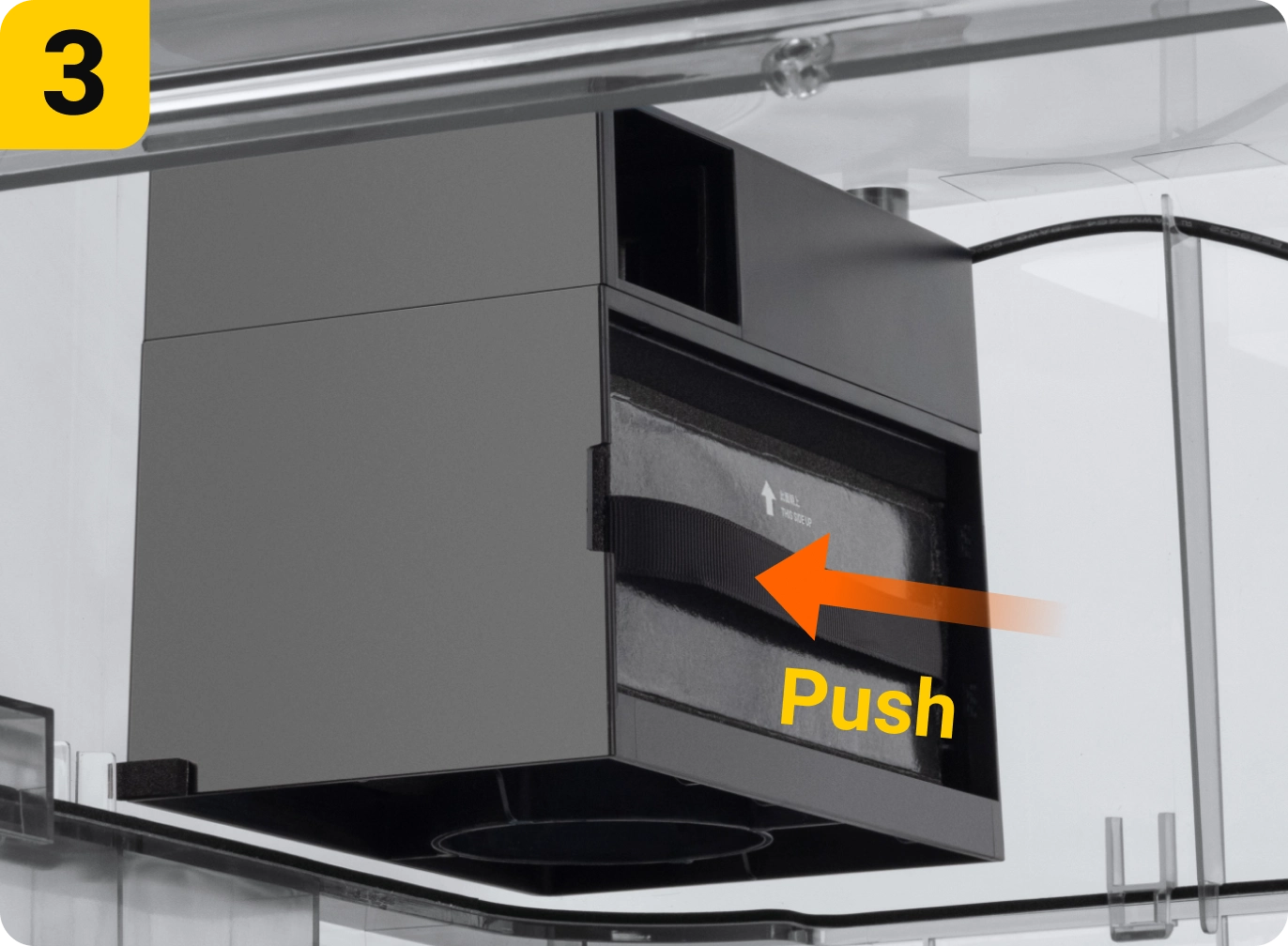 Instruction to push a compartment in an appliance.