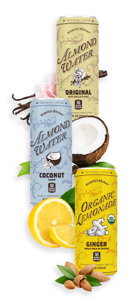 Victoria's Kitchen Original and Coconut Almond Water cans alongside a Organic Lemonade with ginger can. Images of rose, vanilla, count, and lemons surround the can.