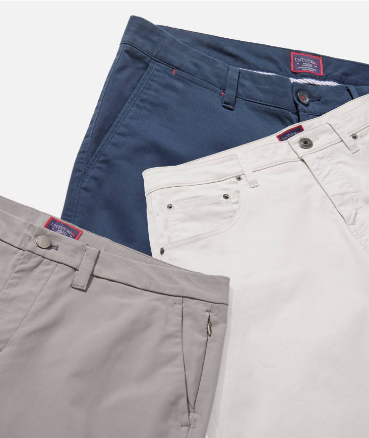 Collection of UNTUCKit trousers. 