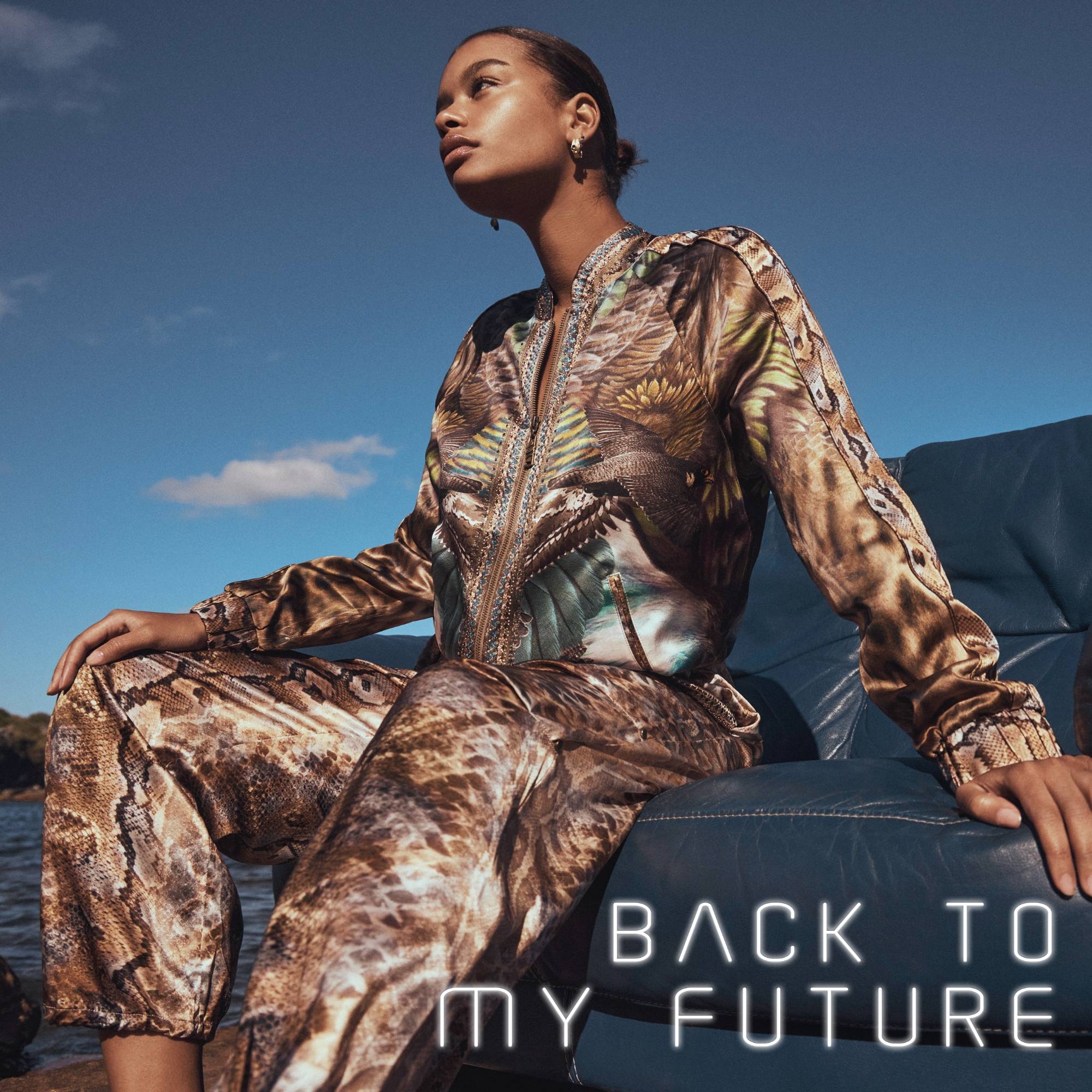 CAMILLA back to my future collection model wearing call of the falcon beige printed silk jacket and pants