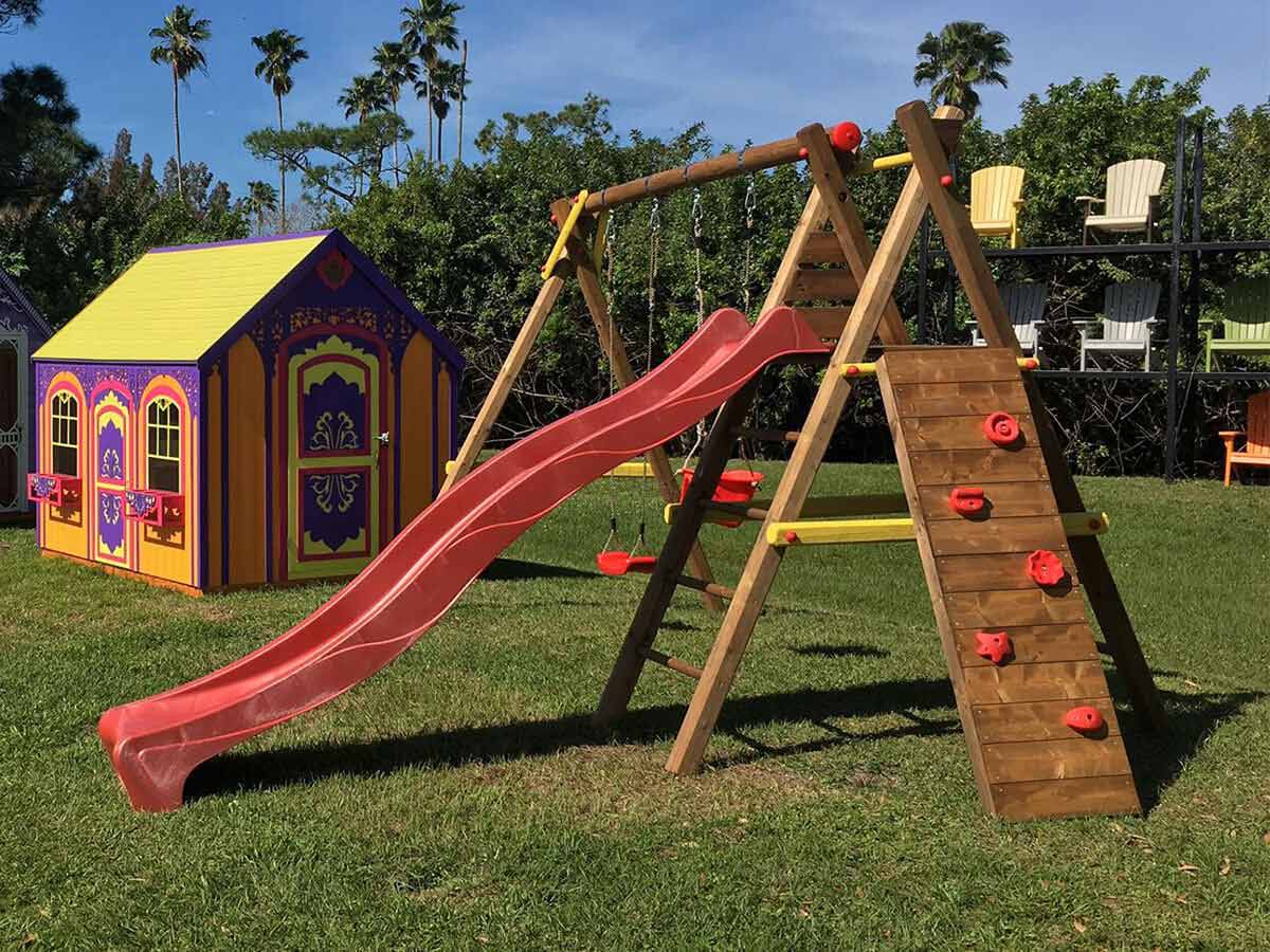Wooden Playset with red slide by WholeWoodPlayhouses