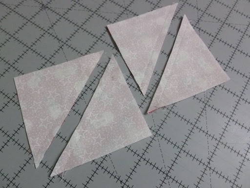 quilt squares cut in 2 triangles