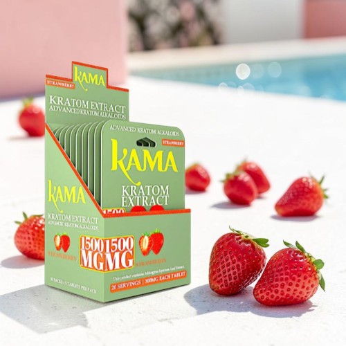 Kama kratom product box with strawberries, by a poolside setting.
