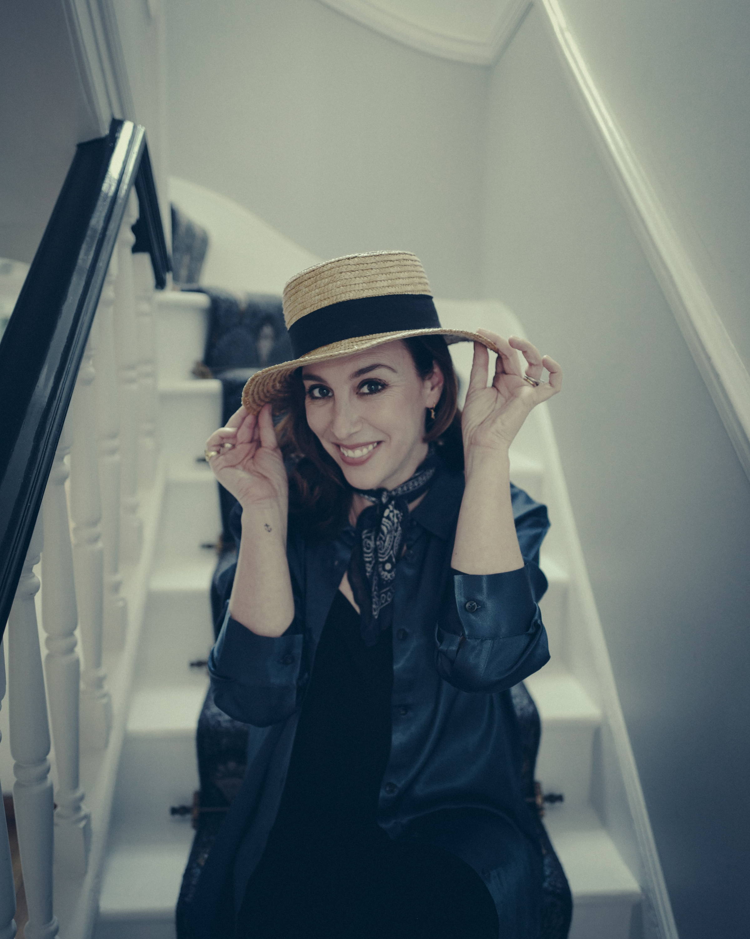 Dee wearing blue bamboo satin oversized shirt