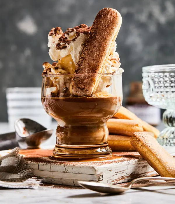 Affogato ice cream garnished with a ladyfinger cookie