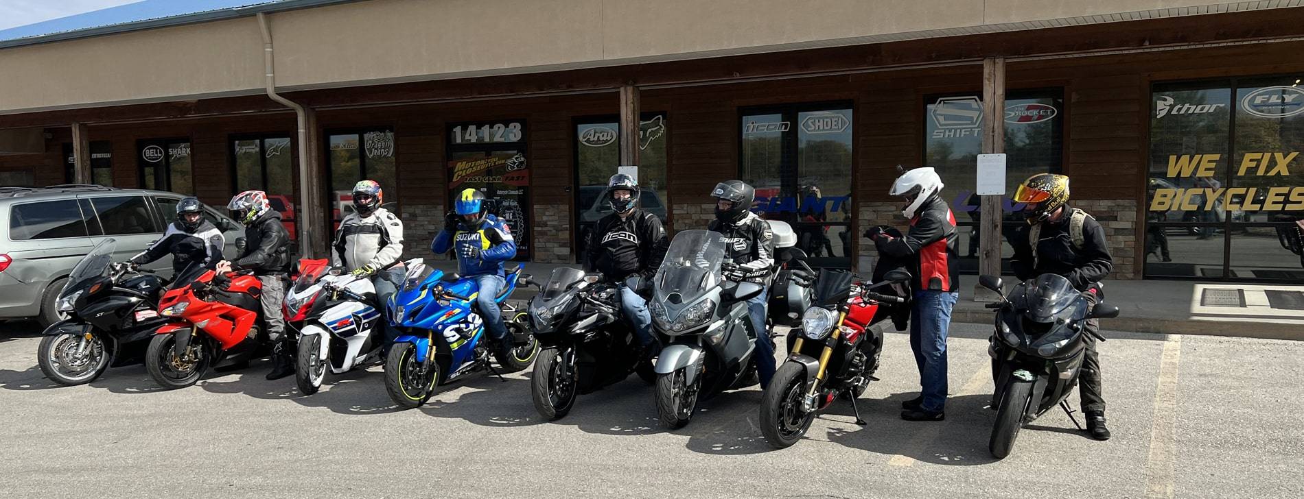 image shows several customers properly dressed on their motorcycles in front of our Smithville MO retail store.