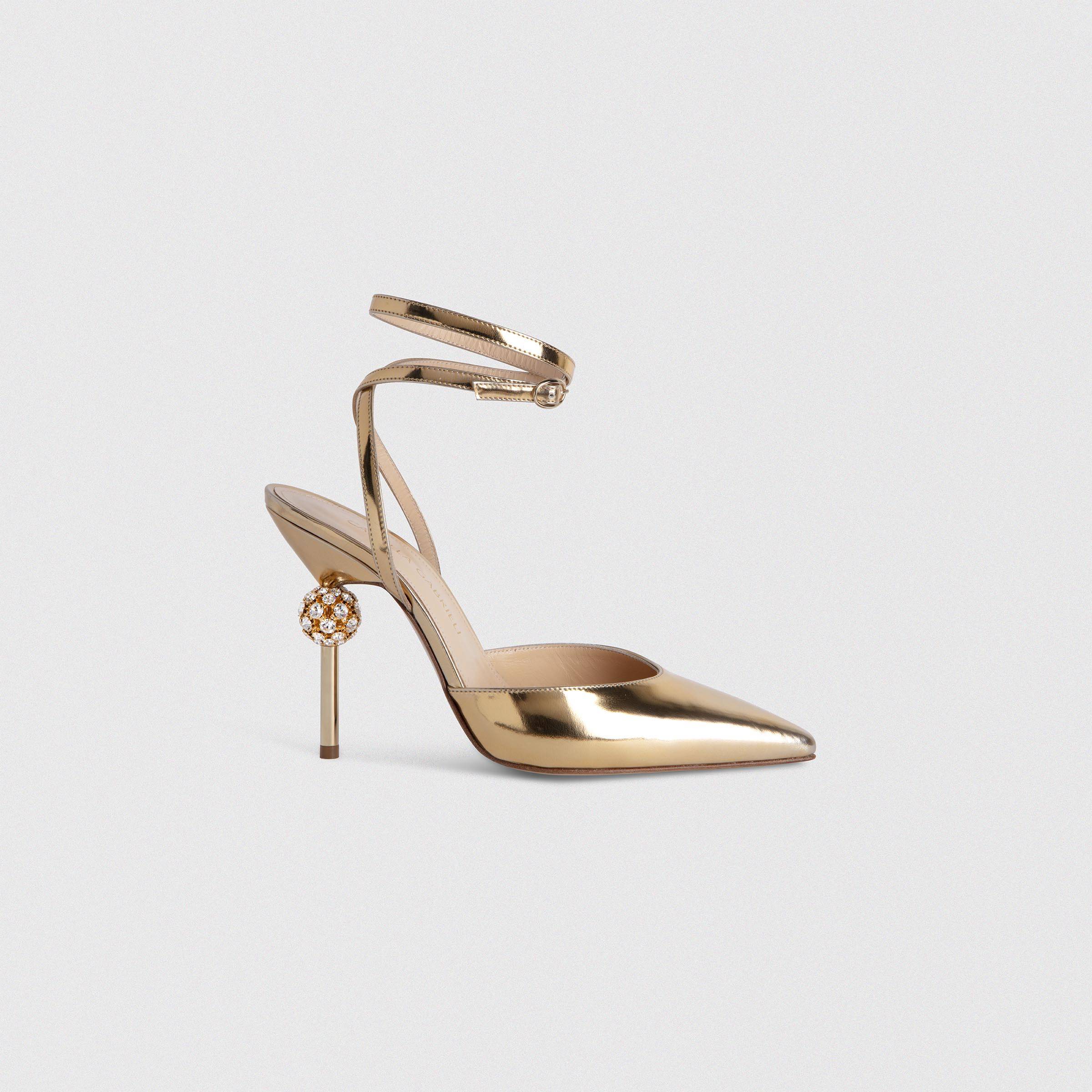 Slingback pumps in mirror gold leather
