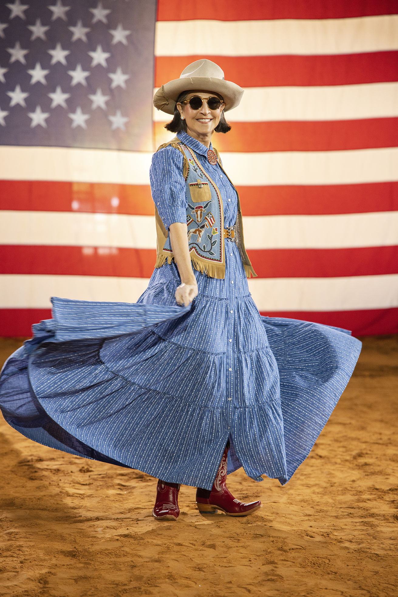 Cheryl wearing the Bunting Blues Dress with the Home of the Brave vest and vintage Double D Ranch accessories. 