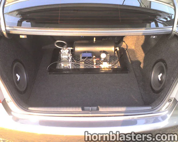 Side profile or street-level view of Jason's 2010 Honda Civic with Conductor's Special 232 train horn kit install context, HornBlasters gallery photo 2