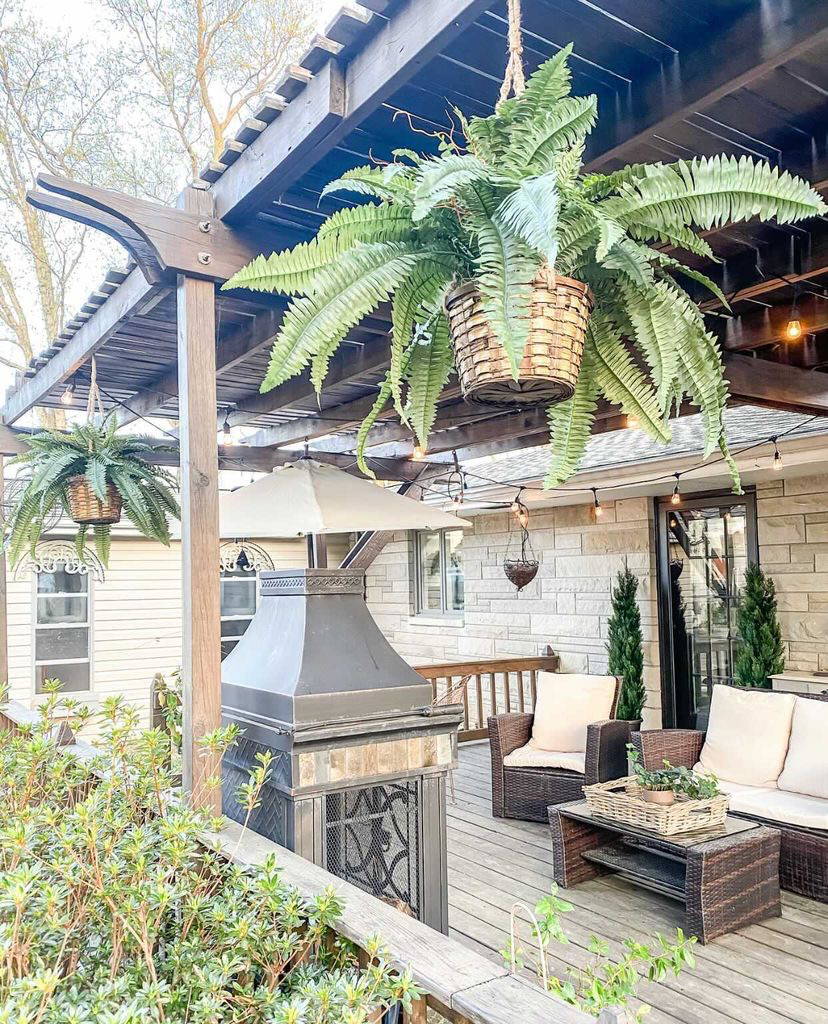 Artificial hanging plant from Nearly Natural hanging on a patio roof