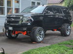 Lifted black Tahoe front view thumbnail