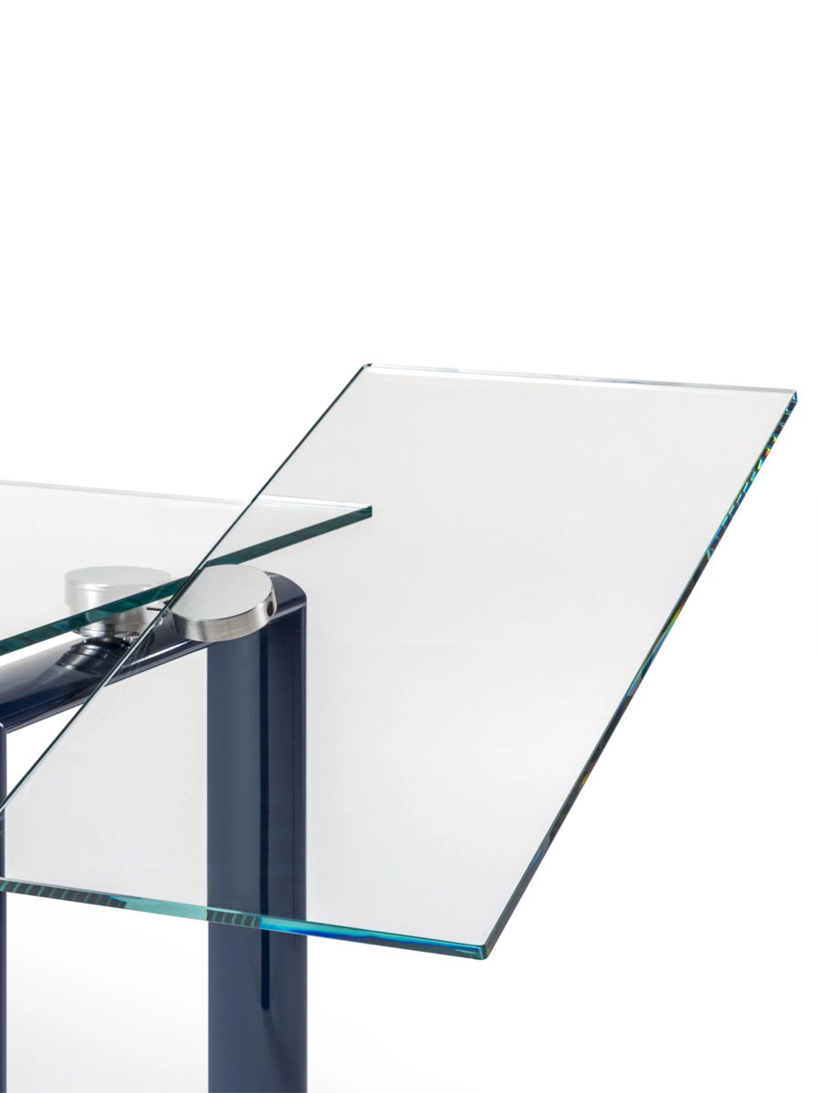 A modern Pocliceto glass table by Reflex Angelo with geometric design elements.