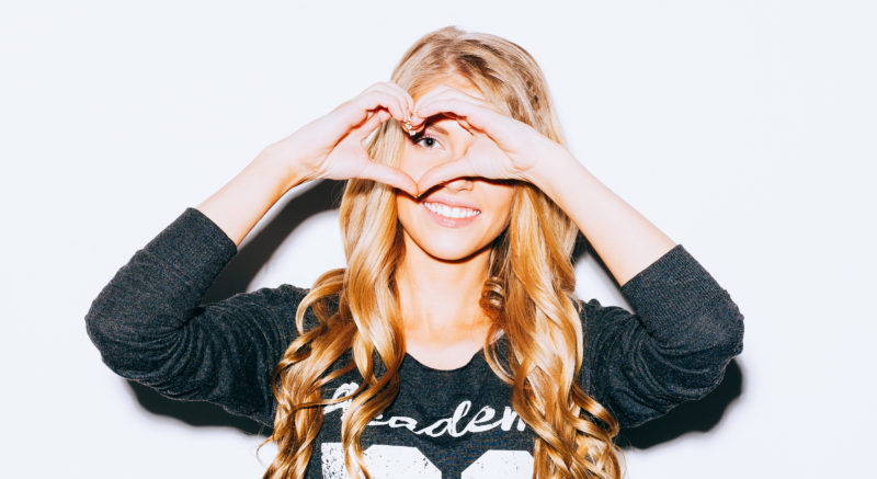 Woman Making Heart Sign 