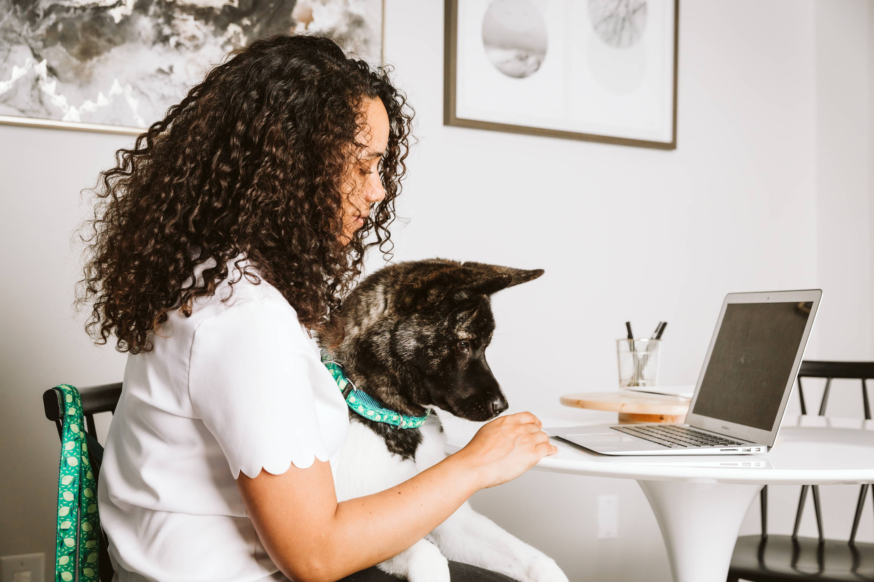 Woman and dog at computer