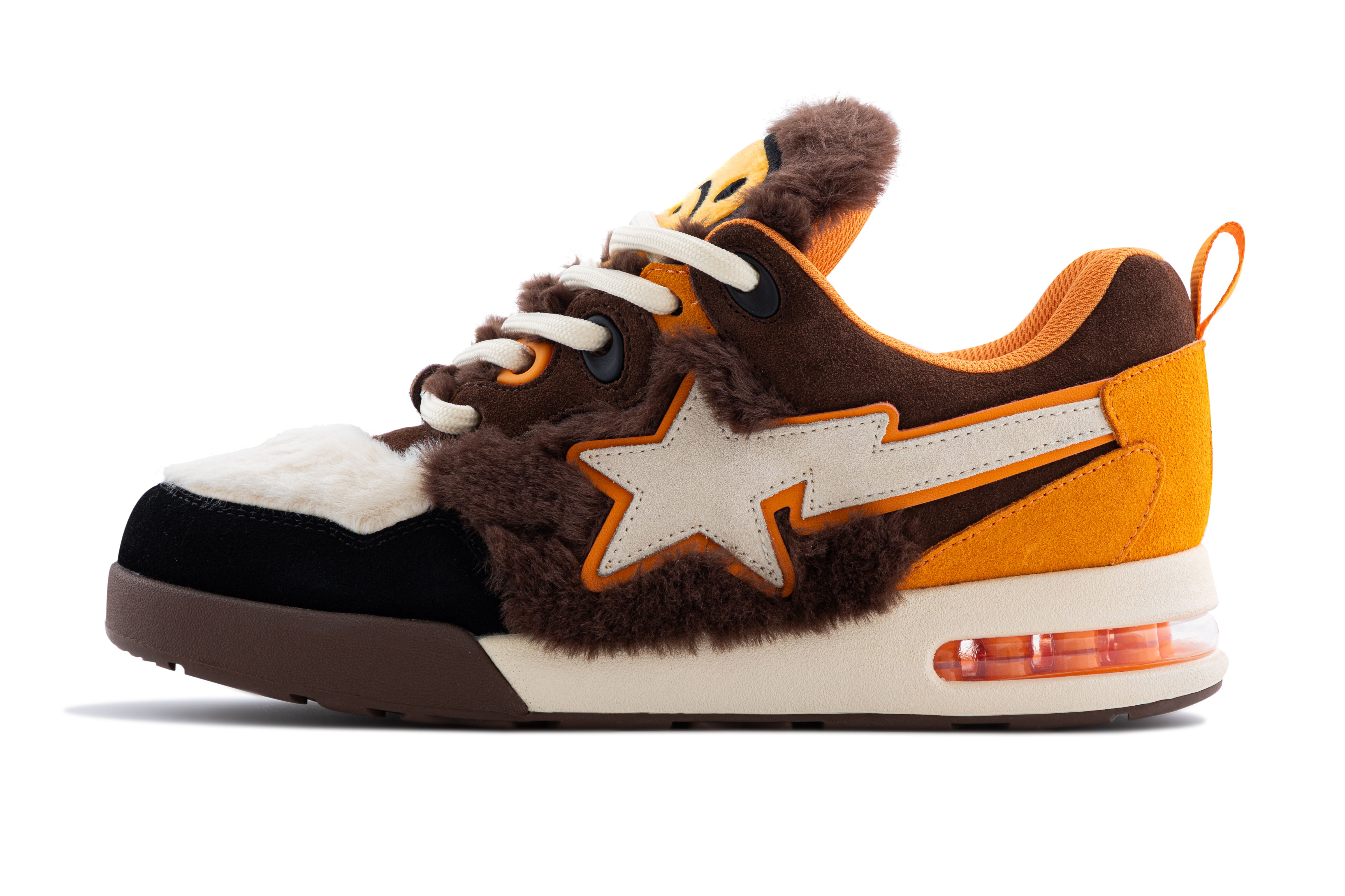 A stylish sneaker with orange, black, and white accents and fur details.