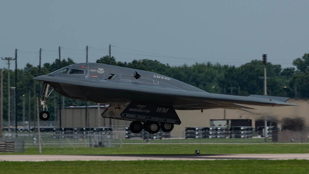 The B-2 Spirit known as the Spirit of Washington, performs a touch and go at Whiteman Air Force Base, Missouri, on July 20, 2021. The Spirit of Washington had just arrived back from Palmdale, CA, where it received routine maintenance and software updates from Northrop Grumman. (U.S. Air Force photo by Airman 1st Class Devan Halstead)