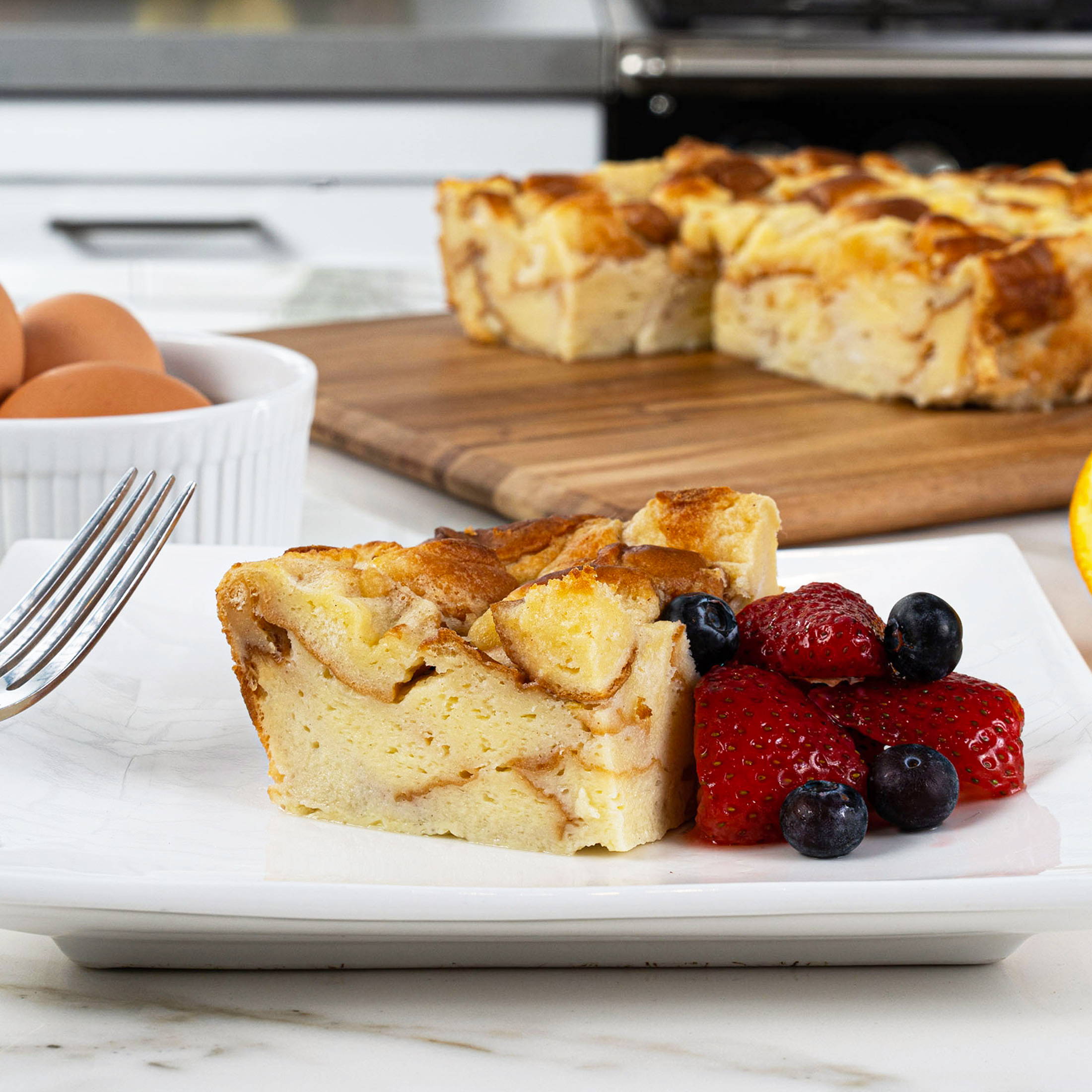 CREAMY COCONUT BREAD PUDDING with MIXED BERRIES