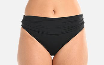 Front image, close-up of model wearing black shirred band hipster swimsuit bottoms.
