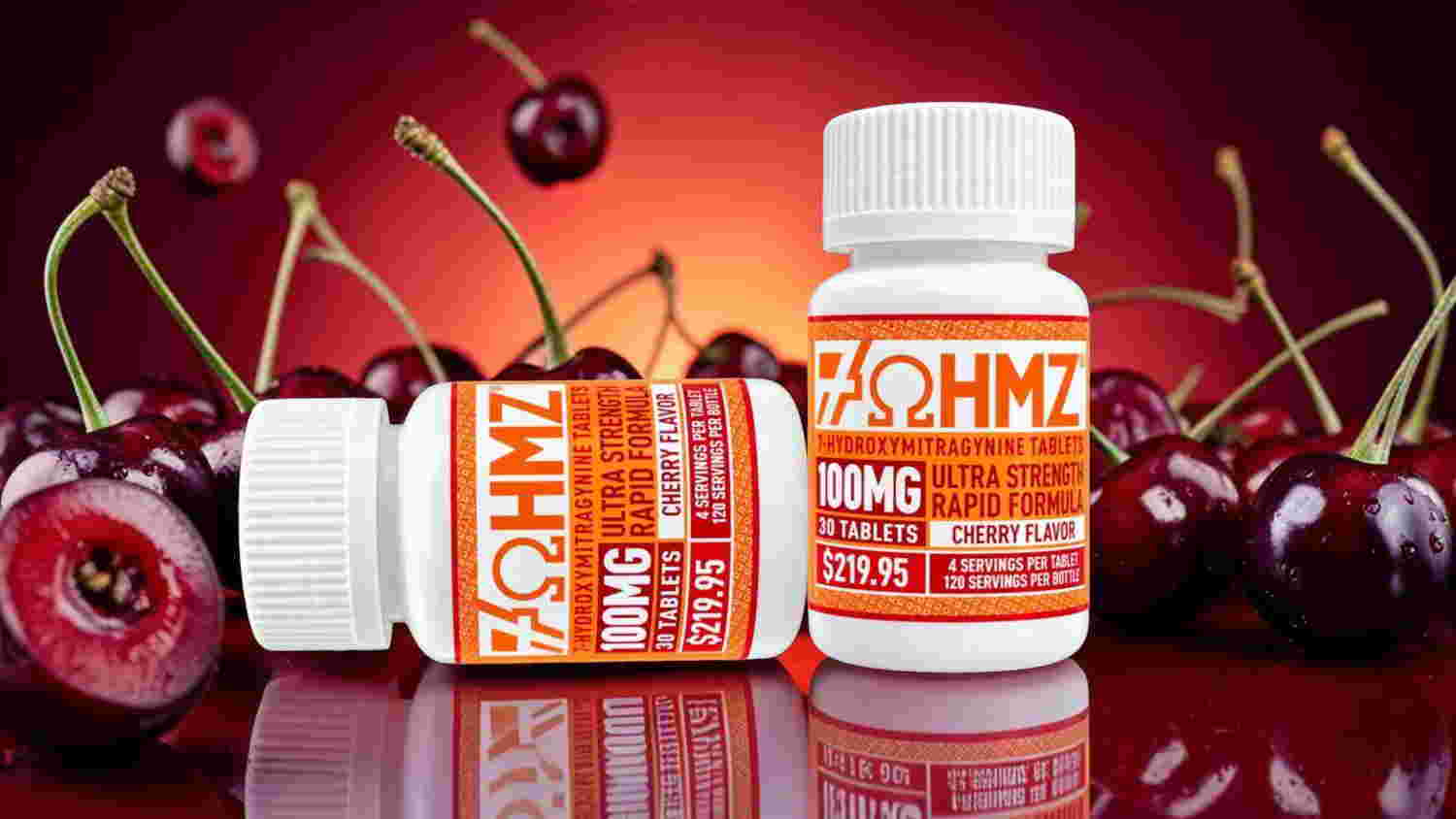 Two bottles of supplements with cherries in the background.