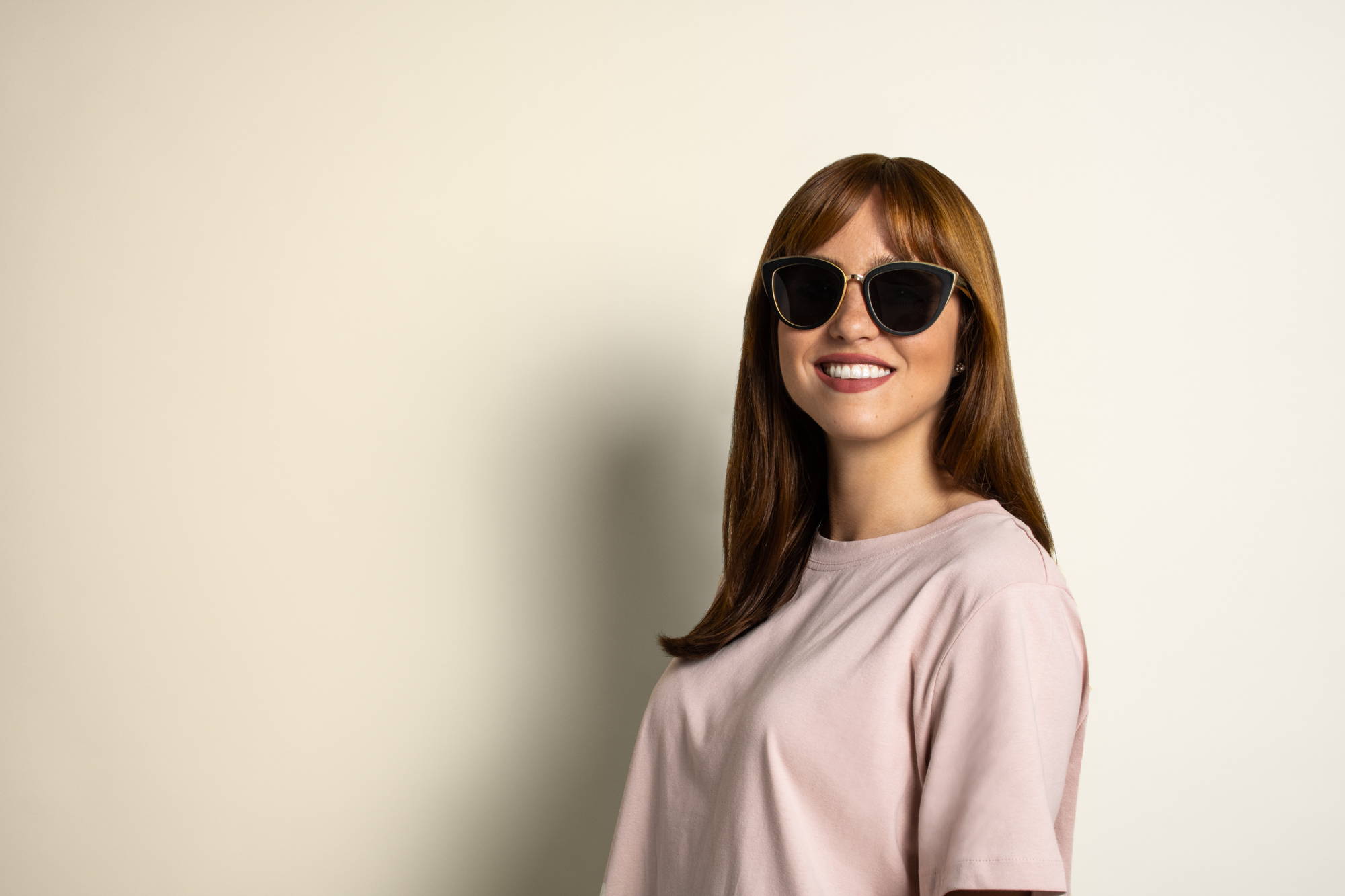 Woman wearing oversized cateye sunglasses