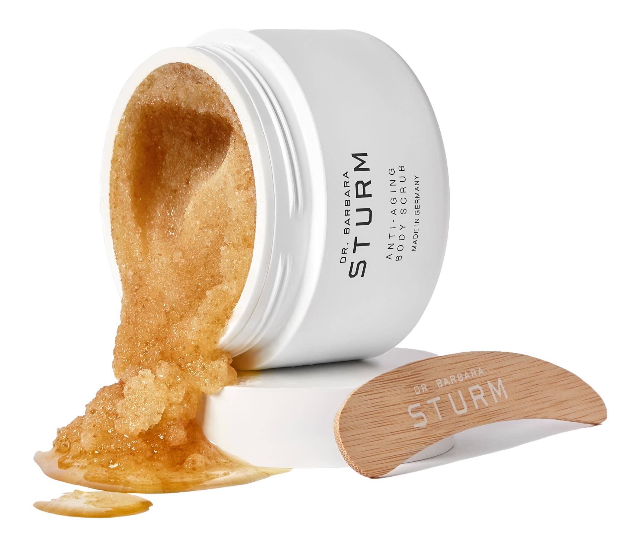 ANTI-AGING BODY SCRUB IN JAR WITH TEXTURE AND SPATULAR