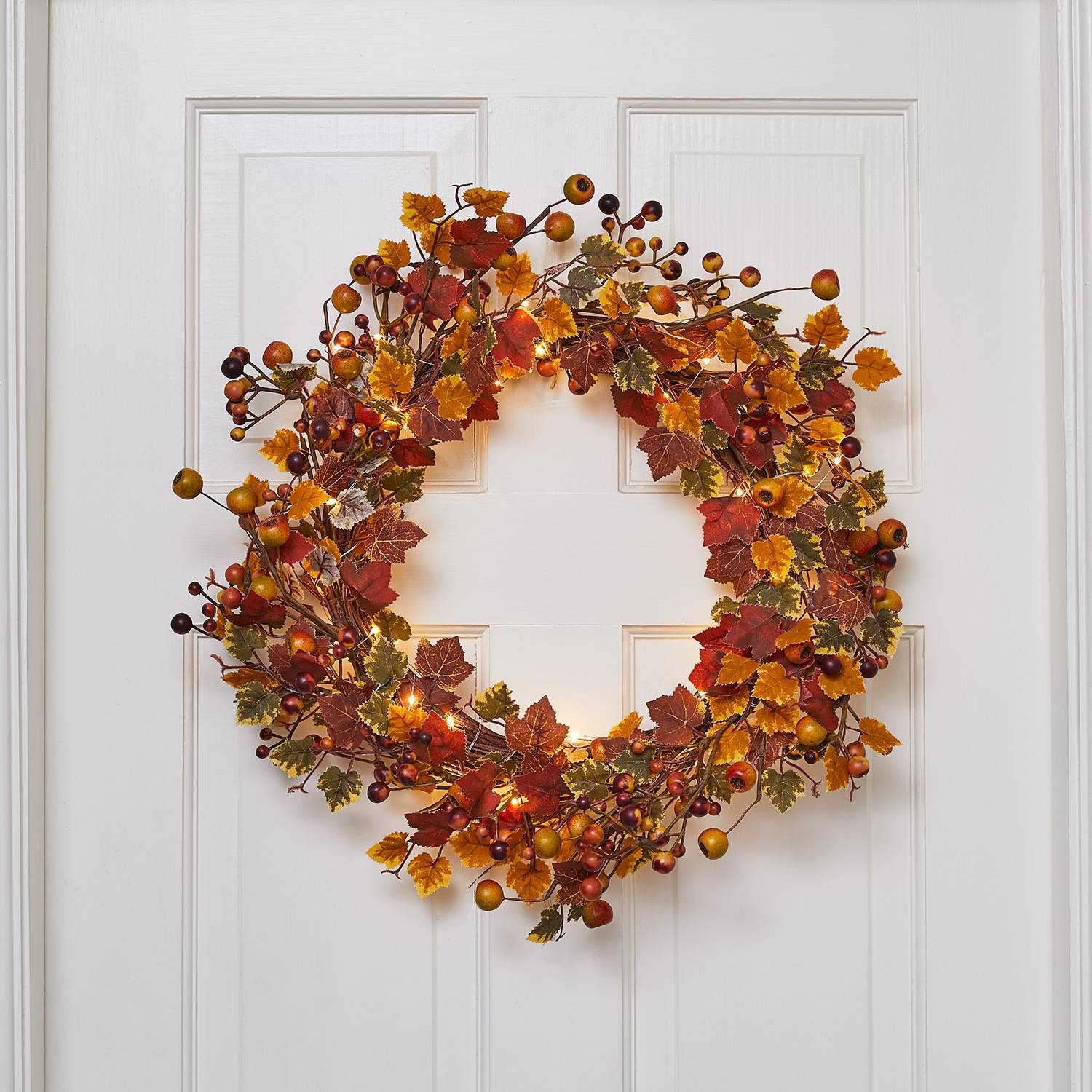 Internal door featuring a harvest autumn wreath entwined in micro lights