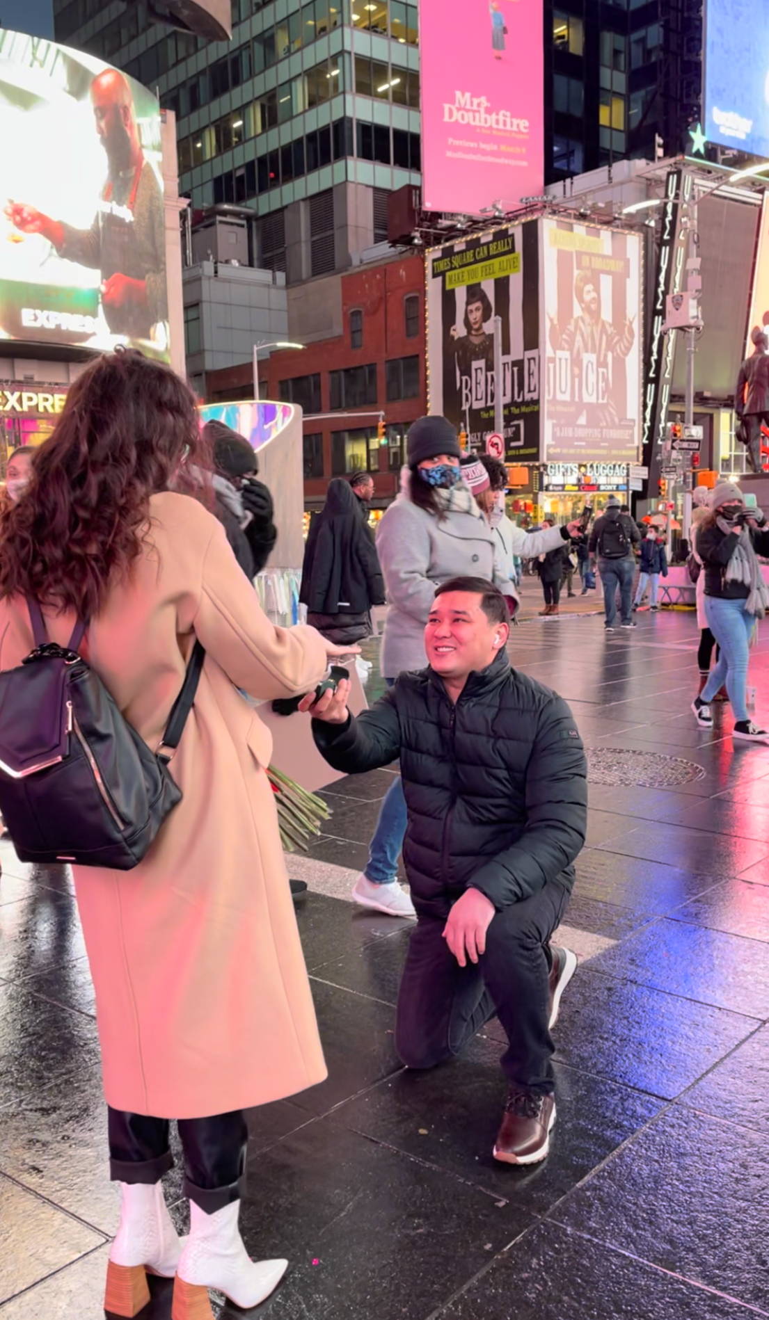 Daniyar Proposing to Elmira in Times Square With An Engagement Ring from Henne Jewelers