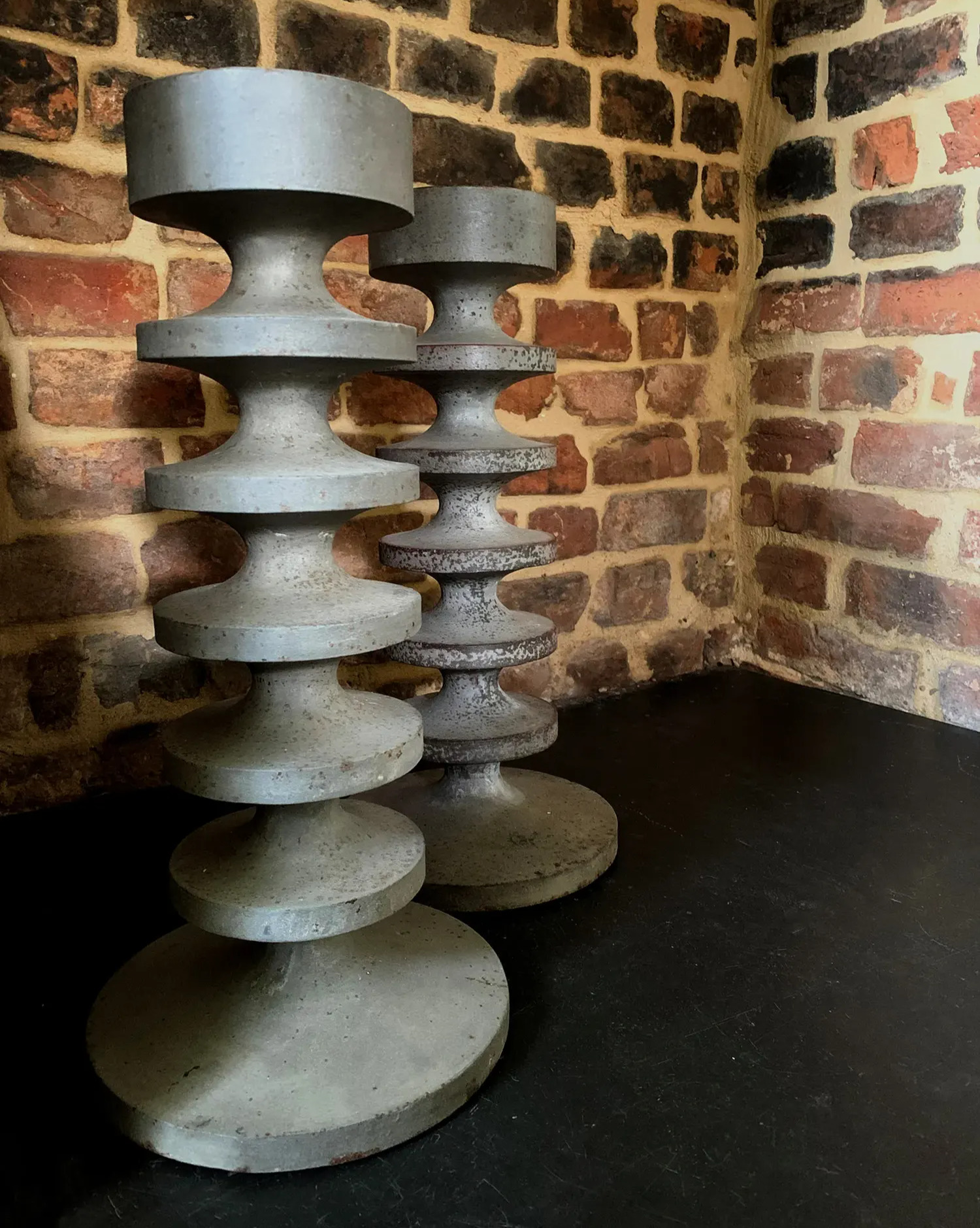 The CD40 cast iron candlesticks, each weigh ½ cwt. (hundredweight) which is roughly 4 stone