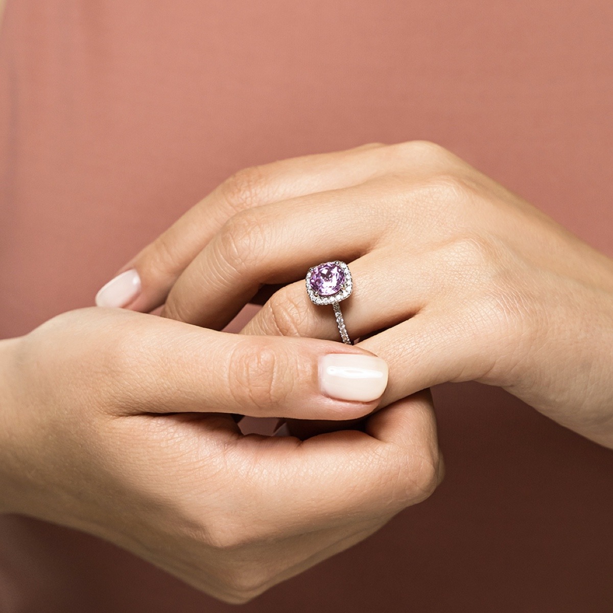 Antique style diamond accented halo engagement ring with 2ct cushion cut lab grown champagne pink sapphire in 14k white gold