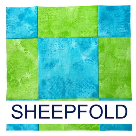 Sheepfold Quilt Block with green and turquoise fabrics