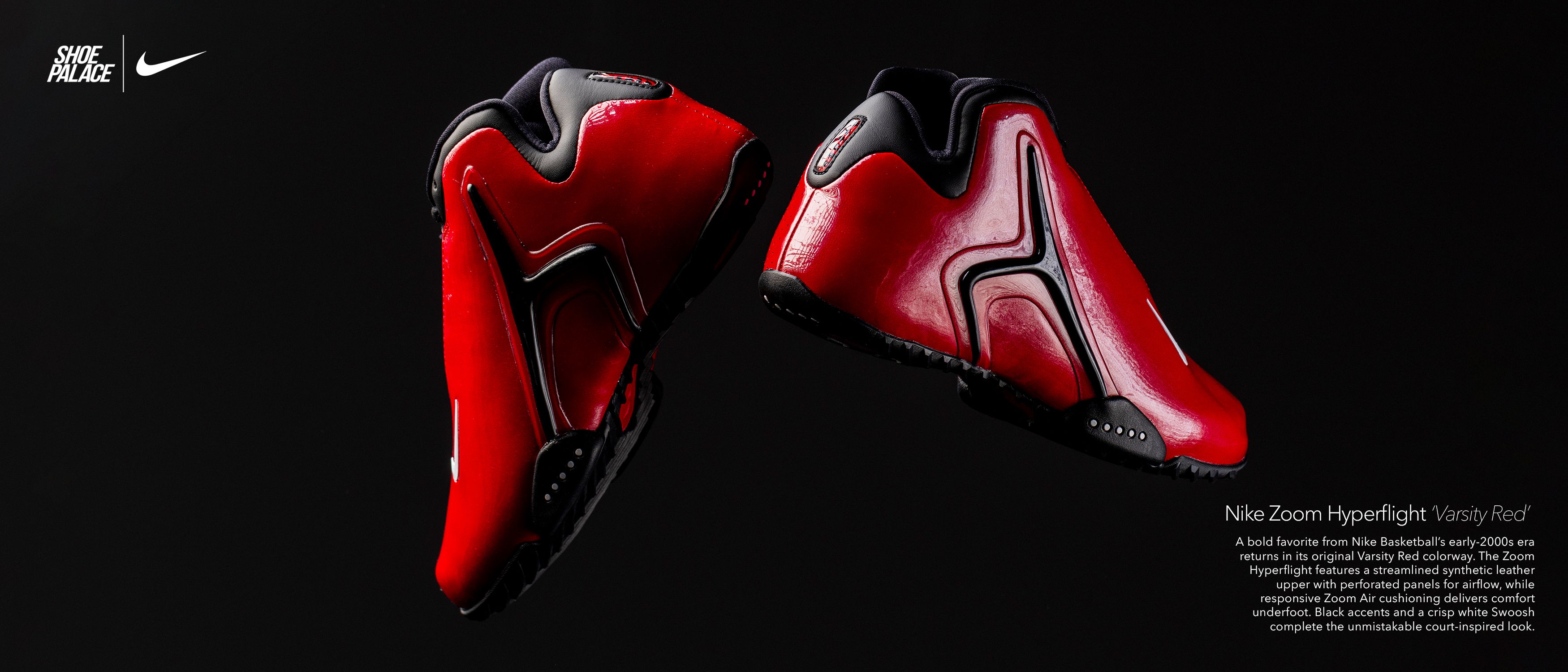 Red Nike shoes displayed on a black background.