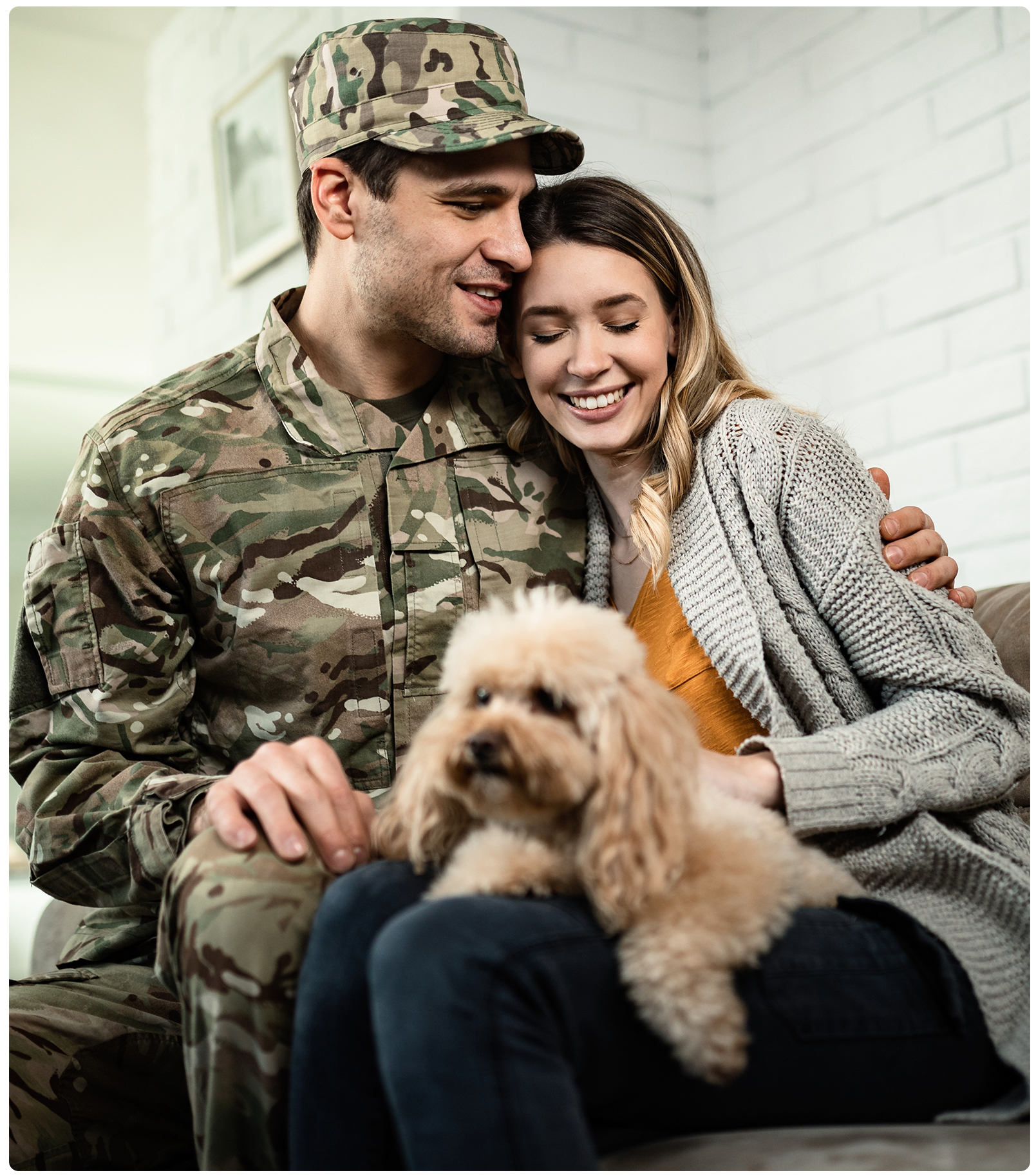 Military member with wife and dog