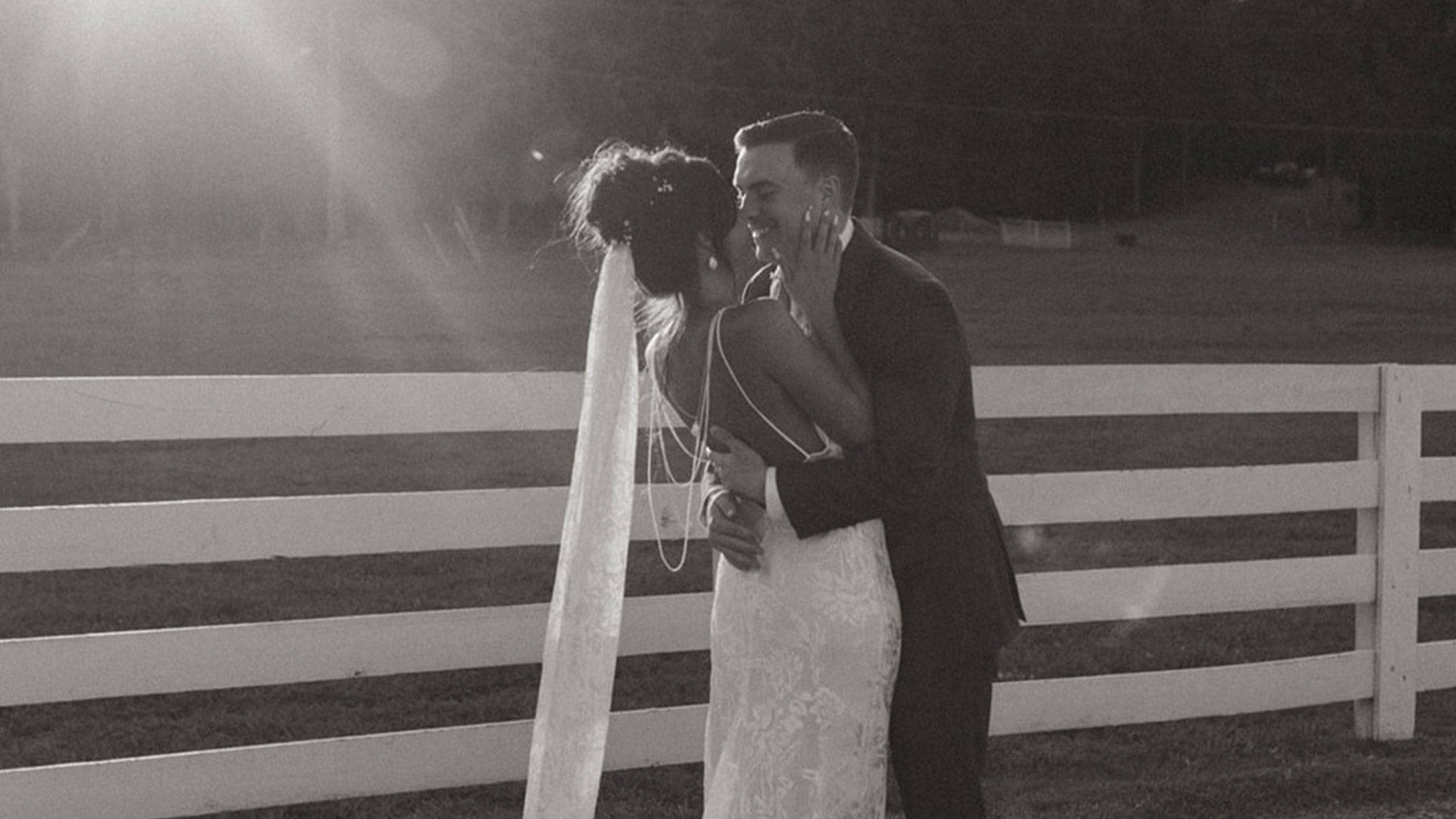 Bride and Groom sharing a kiss