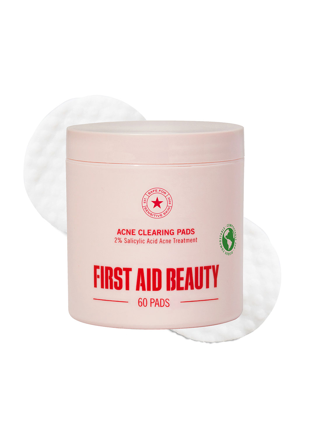 Model swiping First Aid Beauty Acne Clearing Pads on cheek