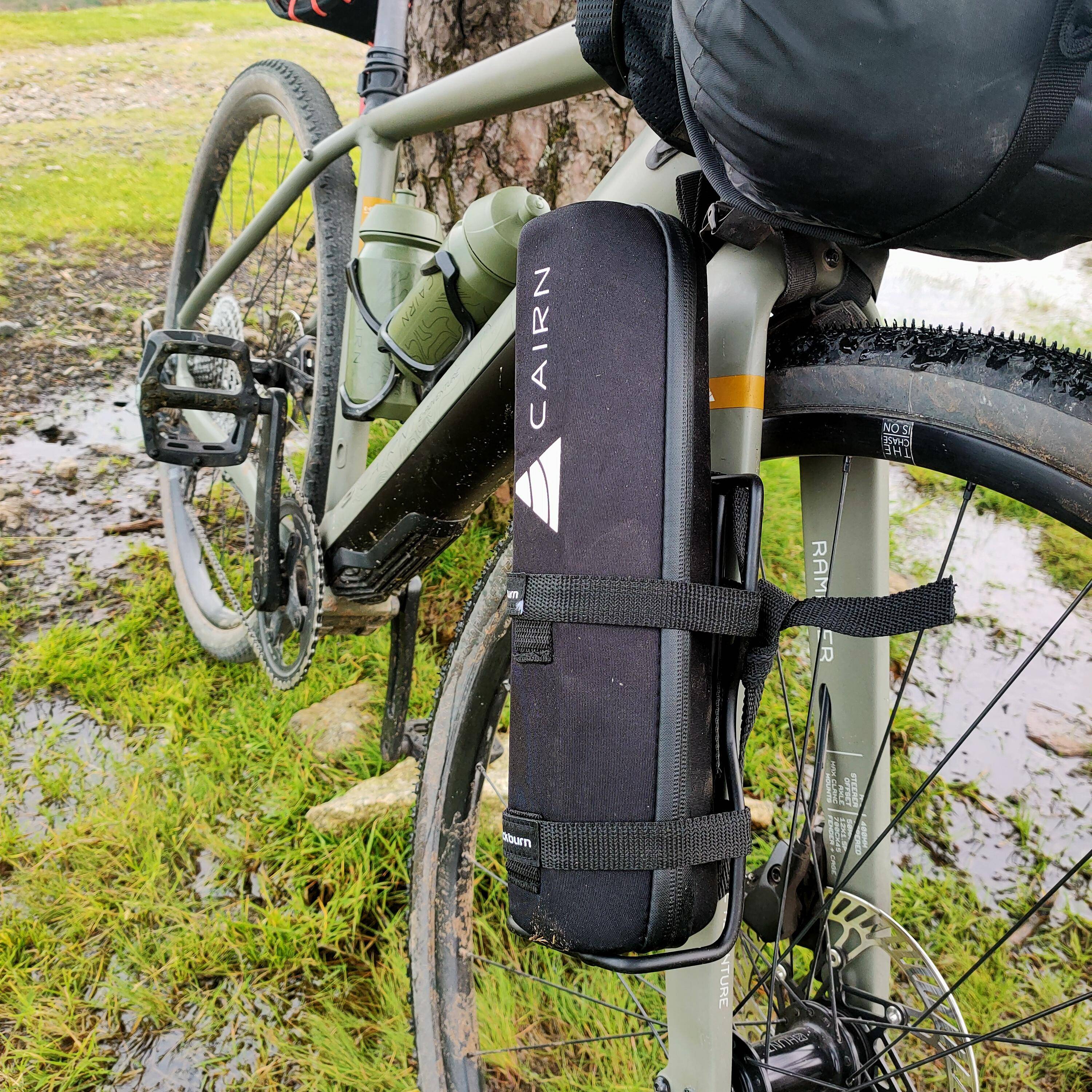 Cairn electric gravel bike fitted with bikepacking bags