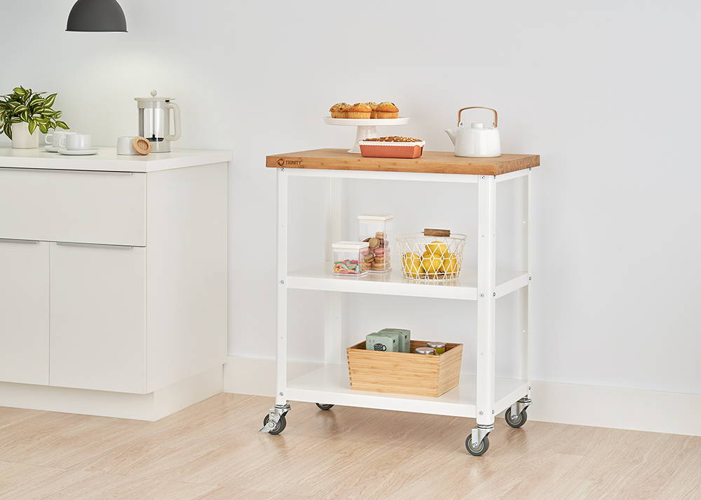 Kitchen cart with items on its shelves and bamboo top attached