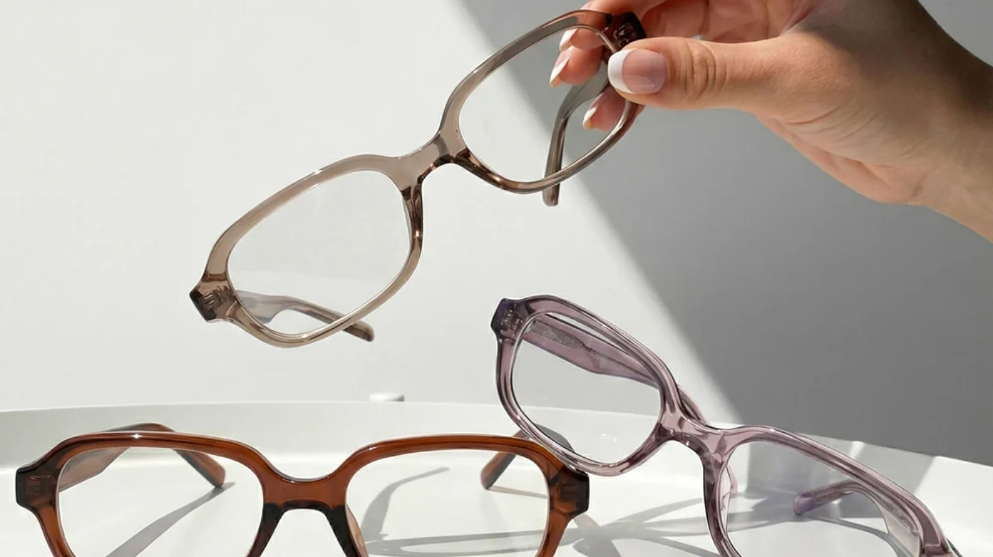  Pair of prescription eyeglasses on a clean white surface