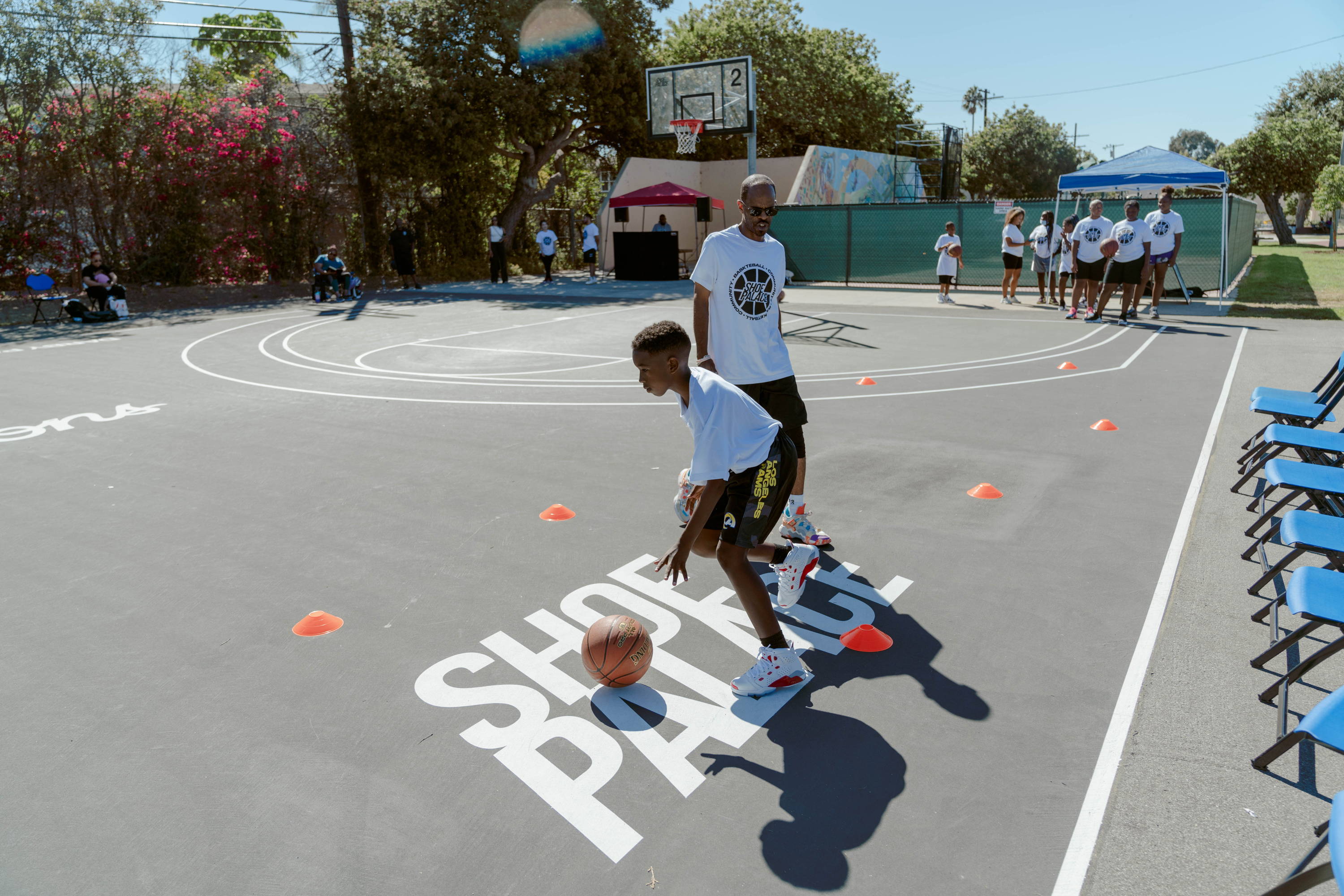 darby park hoop clinic boy practices dribbling