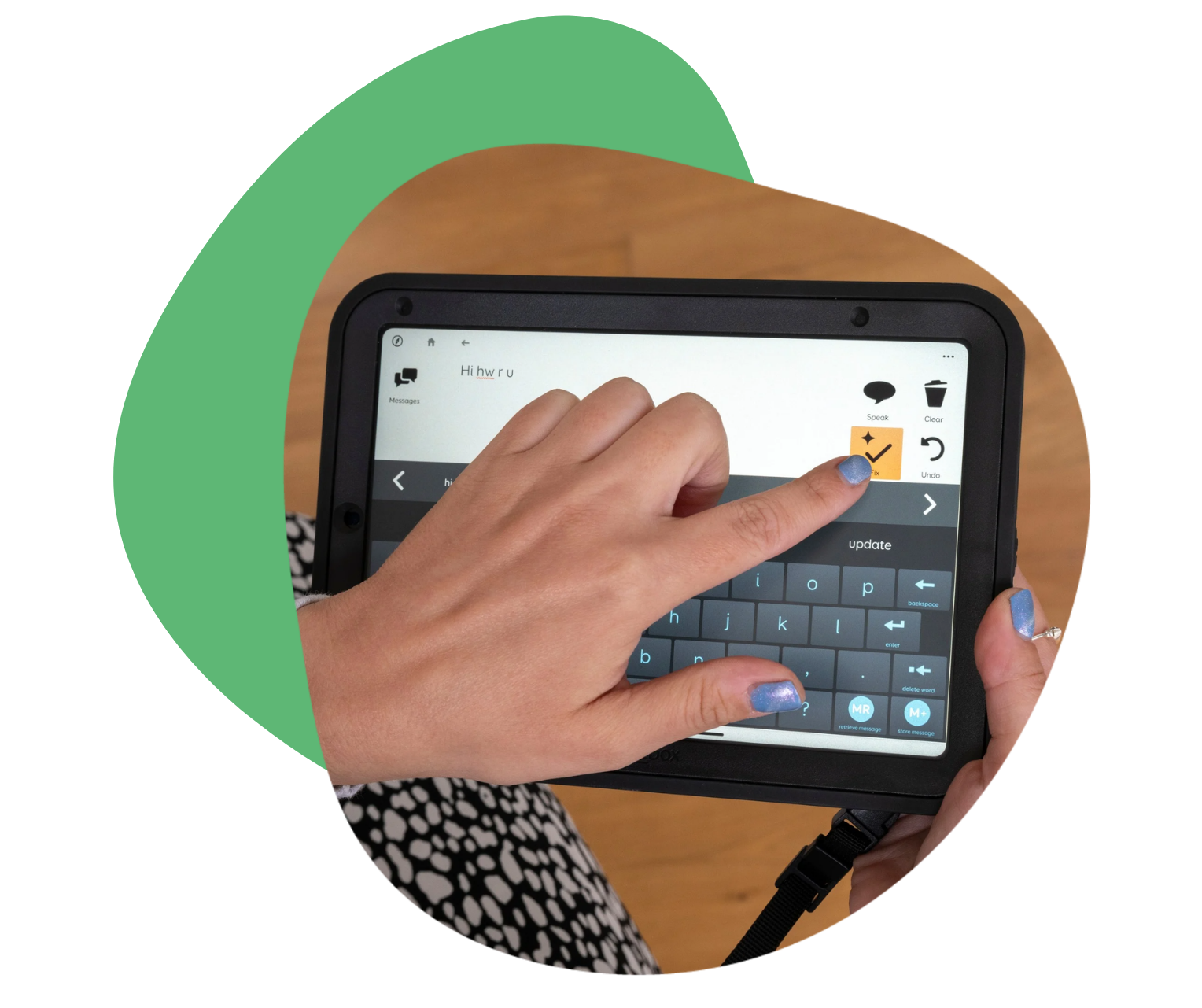 Person using a tablet with a touchscreen keyboard.