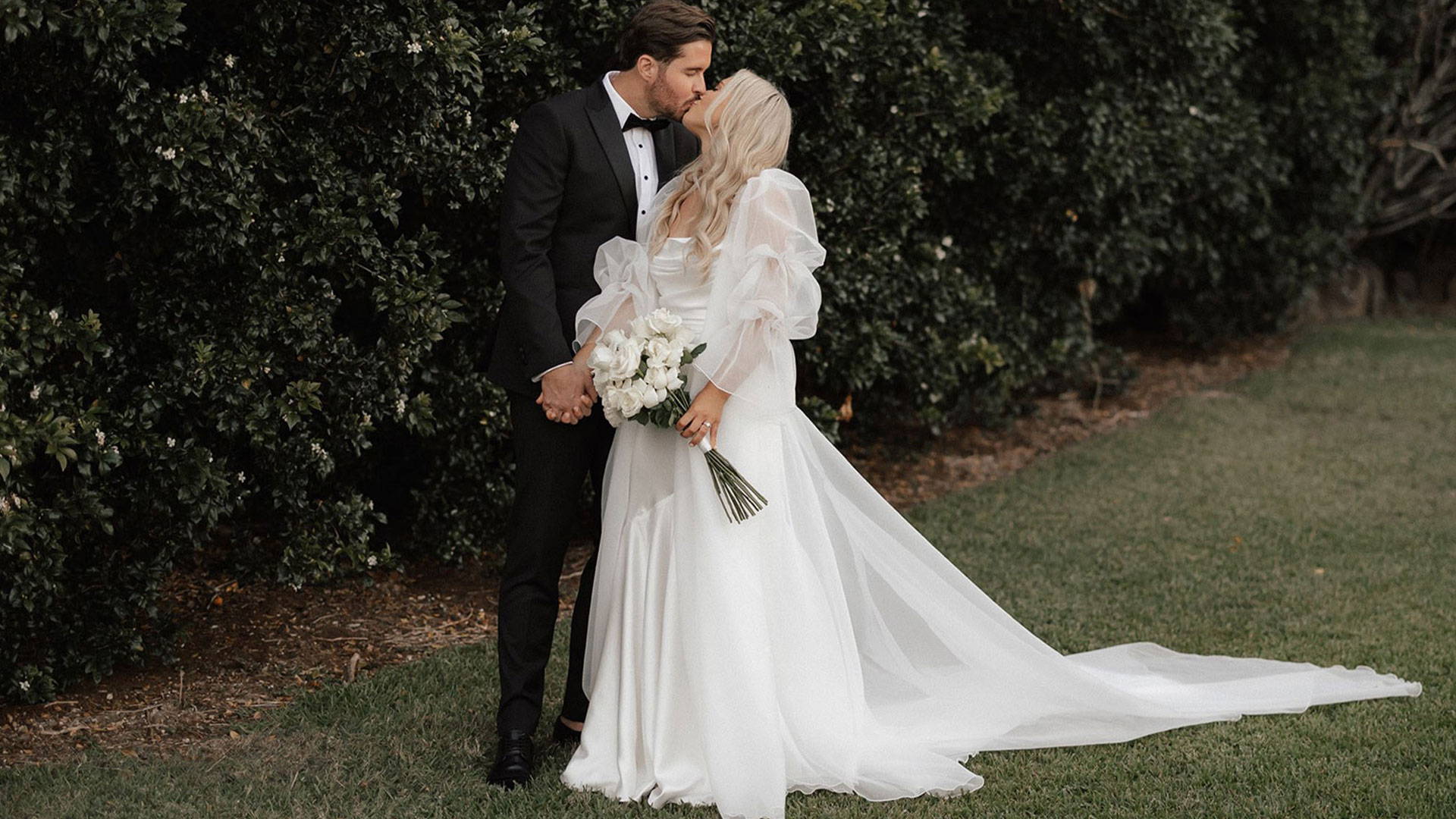 Bride and groom sharing a kiss