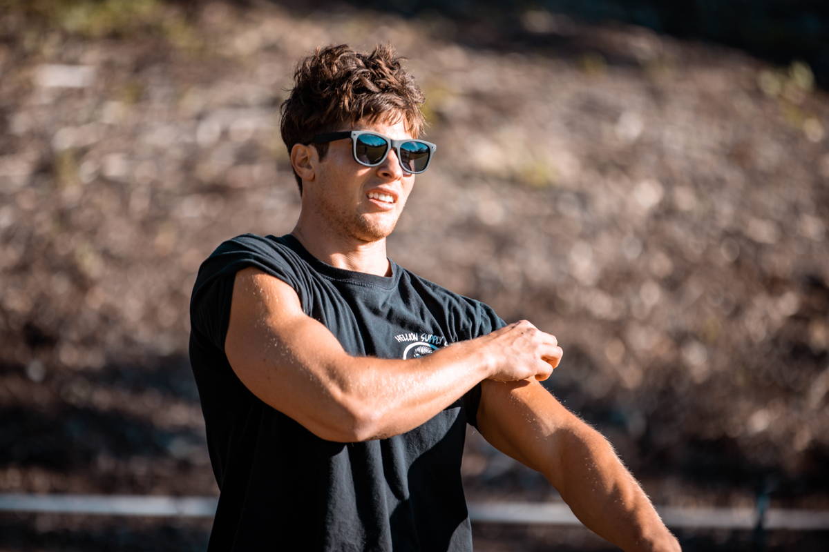 Man wearing black sunglasses with silver lenses